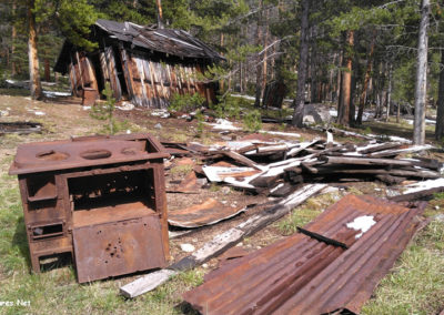 June picture of wood burning stoves in the Coolidge Ghost town. Image is from the Coolidge Montana Picture Tour.