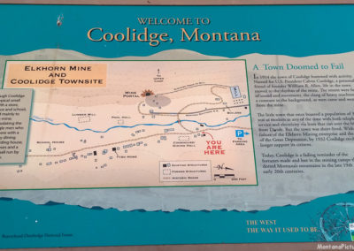 June picture of the Information Sign at the entrance of the Coolidge Ghost town. Image is from the Coolidge Montana Picture Tour.