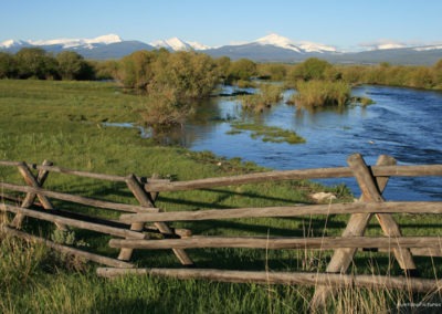 June picture of a wooden Jack Fence and the Big Hole River. Image is from the Wisdom Montana Picture Tour.