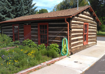 July picture of Glover Log Cabin in Washoe Park. Image is from the Anaconda Montana Picture Tour.