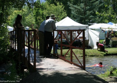 July picture of elderly men on a bridge in Washoe Park. Image is from the Anaconda Montana Picture Tour.