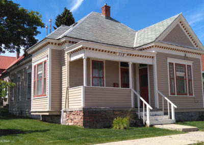 July picture of a residential home with a stone foundation in Anaconda Montana. Image is from the Anaconda Montana Picture Tour.