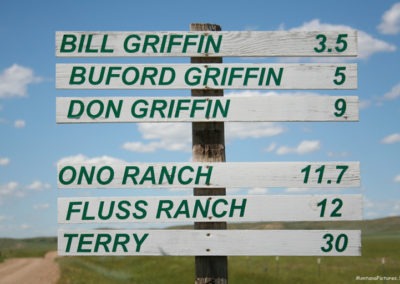 June picture of a sign of the Montana ranches found along the Tongue River. Image is from the Tongue River Picture Tour.