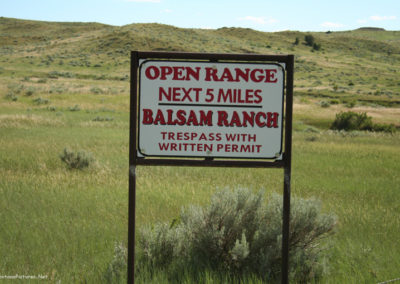 June picture of a No Trespassing sign near the Powder River. Image is from the Powder River Picture Tour.