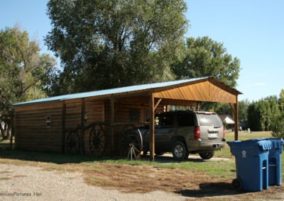 September picture of a modern log cabin home in Custer, Montana. Image is from the Custer, Montana Picture Tour.