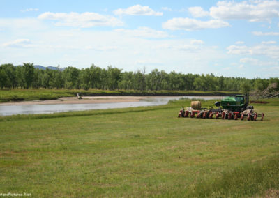 June picture of the tractor near the Powder River. Image is from the Powder River and Tongue River, Montana Picture Tour.