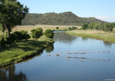 July picture of Barb Wire strung across of the Tongue River. Image is from the Powder River and Tongue River, Montana Picture Tour.