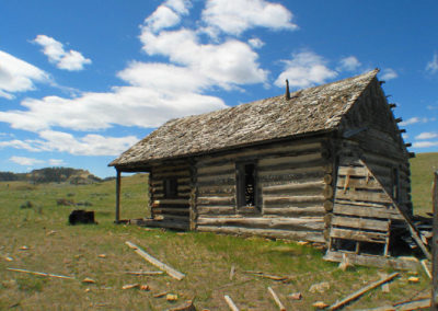 June picture of an abandoned Log Cabin located north of Lame Deer. Image is from the Lame Deer, Montana Picture Tour.