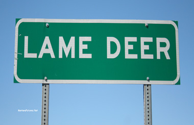 June picture of the Lame Deer, Montana sign on Highway 212. Image is from the Lame Deer, Montana Picture Tour.