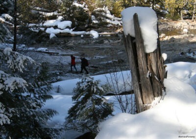 February picture of hikers walking towards the Jerry Johnson Hot Springs. Image is from the Jerry Johnson Hot Springs Picture Tour.