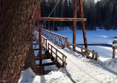 February picture of the foot bridge spanning the Lochsa River in the Clearwater National Forest. Image is from the Jerry Johnson Hot Springs Picture Tour.