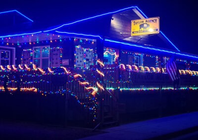 December view of the Taylor Agency Real Estate Office Christmas Lights on Main Street in downtown Augusta, Montana.