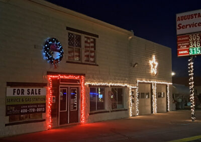 December view of Christmas Lights on Augusta Service Station in Augusta, Montana.