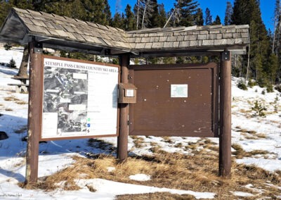 December view of the Stemple Pass trailhead sign. The pass is located 20 miles south of Lincoln Montana.