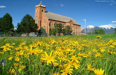May picture of the old Mission Church in St Ignatius, Montana on Highway 93. Image is part of the St Ignatius, Montana Picture Tour.