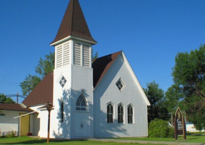 July picture of the "Little White Church" in Malta, Montana