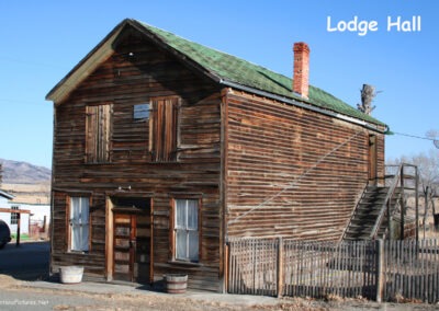 January picture of a two-story wooden Lodge Hall building in Radersburg, Montana