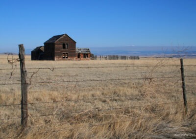 January picture of an abandoned wooden clap board outside Radersburg, Montana